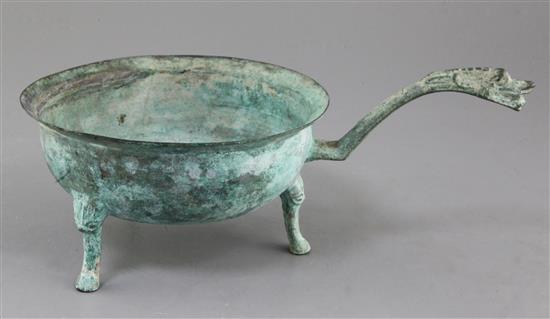A Chinese archaic bronze tripod wine-warming vessel, Jiao Dou, Eastern Han dynasty, 1st-3rd century A.D., 13.5cm high, 32cm long